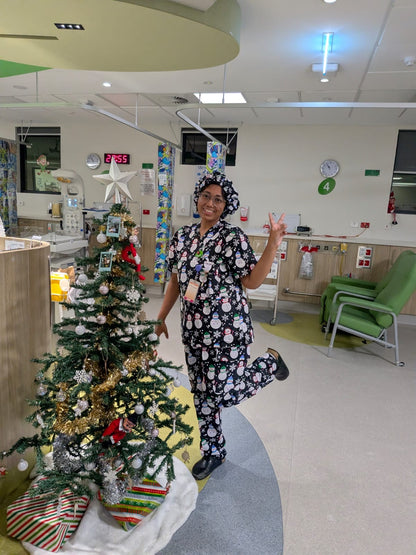 Christmas scrub black snow man